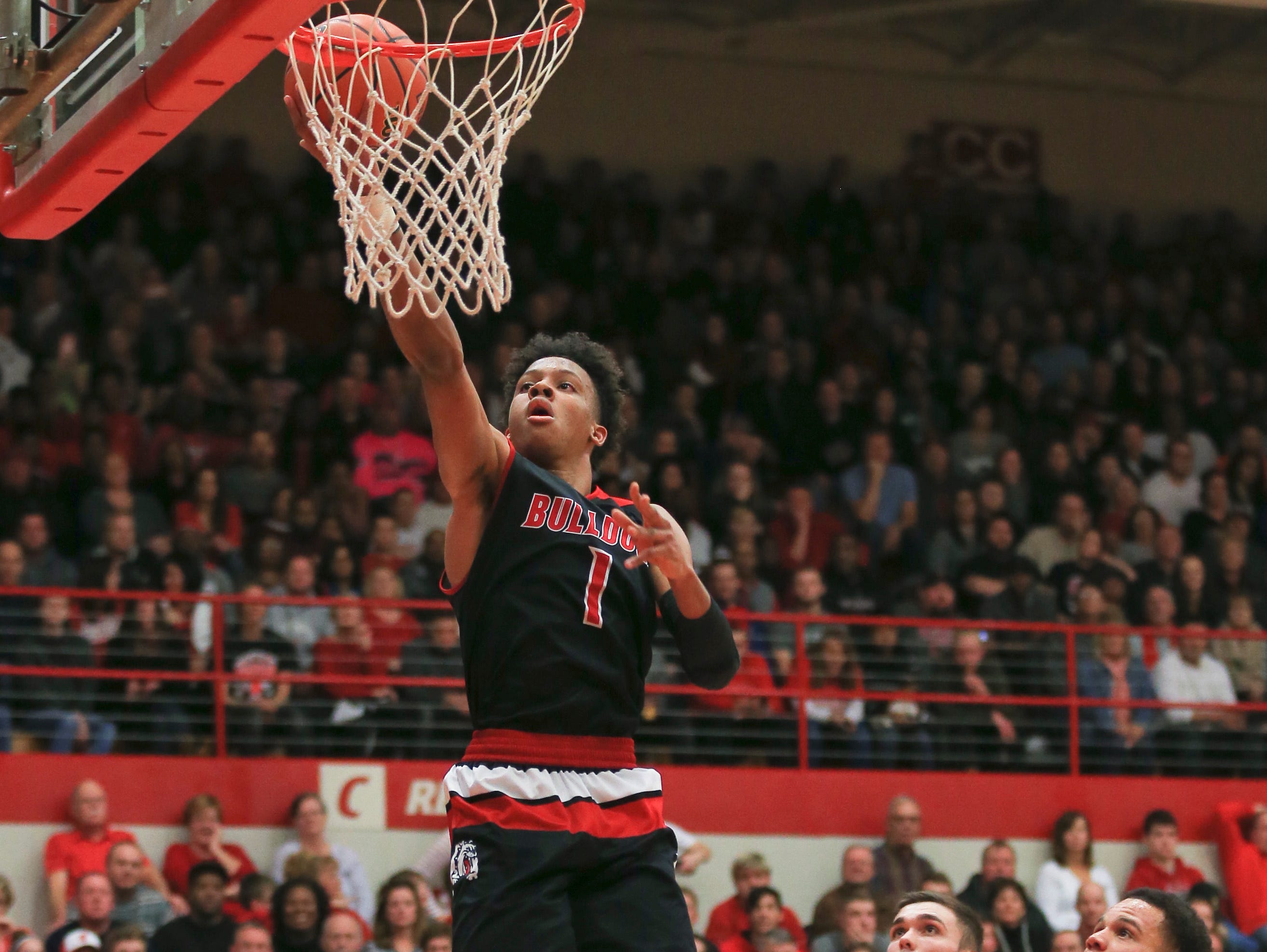New Albany's Romeo Langford had 32 points with seven rebounds and four assists in the Bulldogs' 67-56 win over Jeffersonville Friday night.