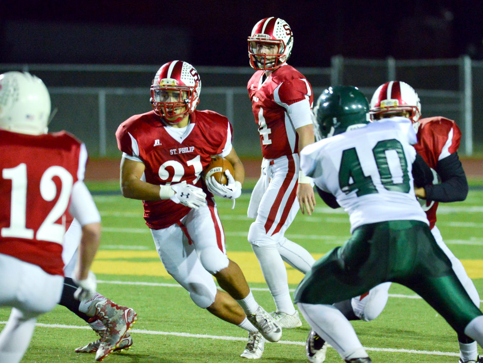 St. Philip's Brayden Darr runs against Portland St. Patrick on Friday.