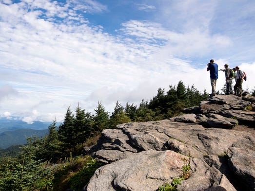 A group of hikers from the state park and conservationists