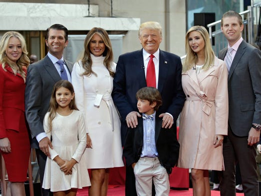 The Trump family poses for photographers at an NBC
