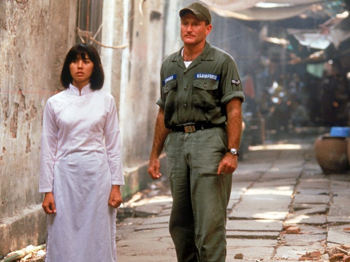 Williams received his first Oscar nomination for his portrayal of DJ Adrian Cronauer, in the 1987 film "Good Morning Vietnam." Chintara Sukapatana played Trin.