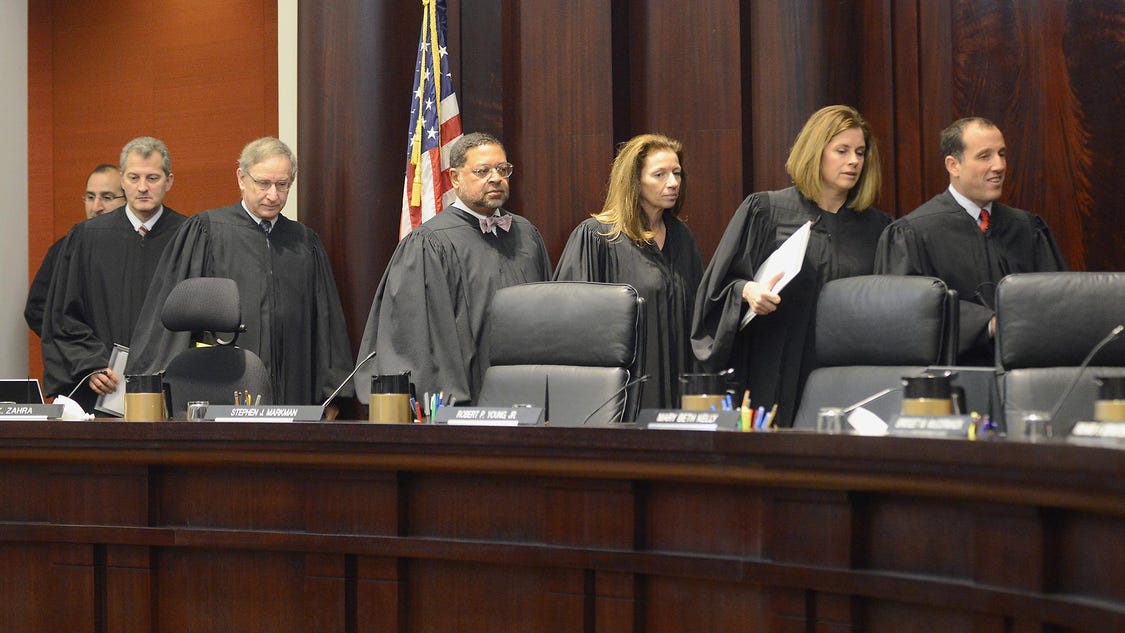 State employees await Michigan Supreme Court decisions