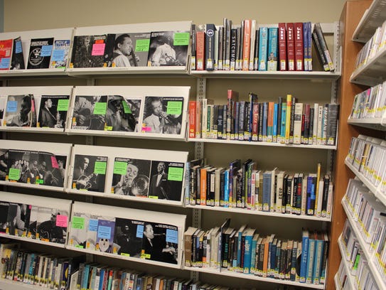 A corner of the small jazz room, full of CDs, books,