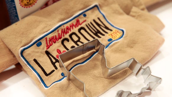 A Louisianana cookie cutter and dish towel available
