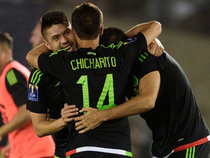 Mexico forward Javier Hernandez (14) celebrates with