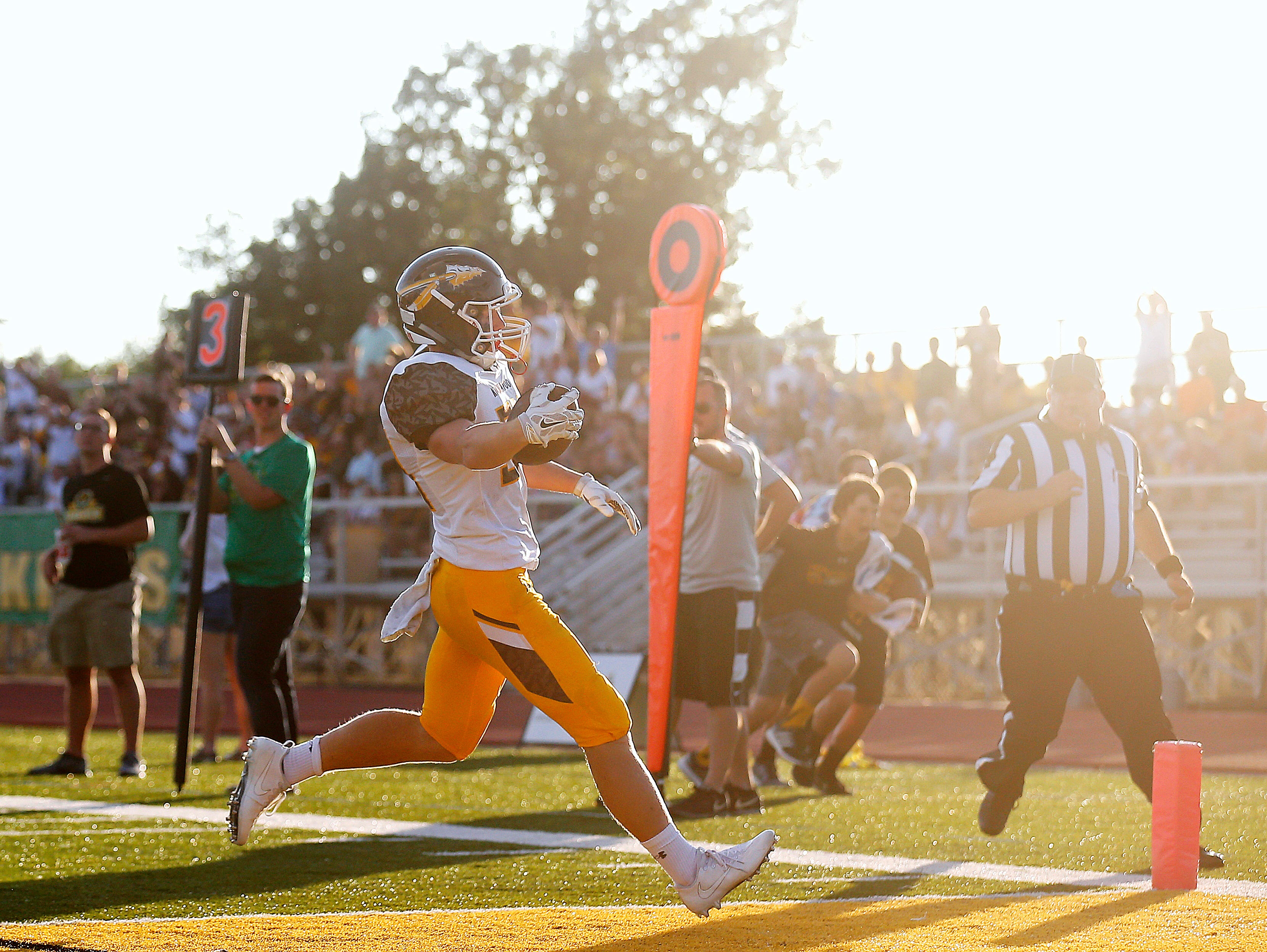Kickapoo High School running back Maverick McGee (34) scores a touchdown during first quarter action of the Chiefs football game against Parkview High School at JFK Stadium in Springfield, Mo. on Aug. 19, 2016.