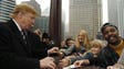 Donald Trump signs autographs for a crowd prior to
