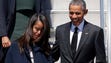 Malia Obama and her father arrive on Air Force One