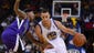 Golden State Warriors point guard Stephen Curry (30) dribbles the ball against Sacramento Kings point guard Isaiah Thomas (22, left) during the second quarter at Oracle Arena.