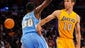 Los Angeles Lakers guard Steve Nash (10) passes the ball away from Denver Nuggets forward Quincy Miller (30) during the first half at Staples Center.
