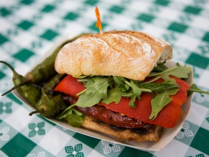 Meet and taste from local vendors with small plates like this sandwich.