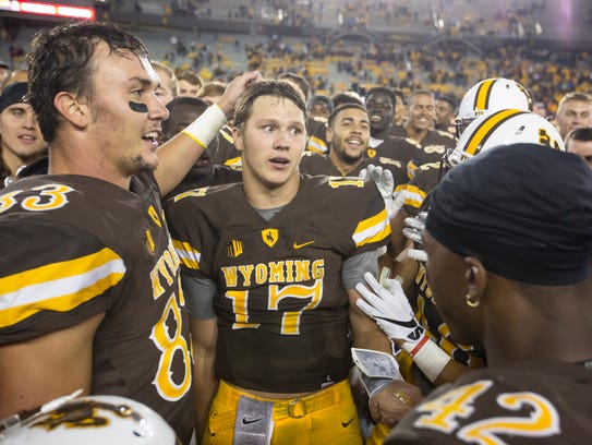Inside the game: Wyoming QB Josh Allen naked and famous