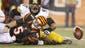 Cincinnati Bengals quarterback AJ McCarron (5) fumbles