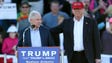 Donald Trump stands next to Sessions during a rally