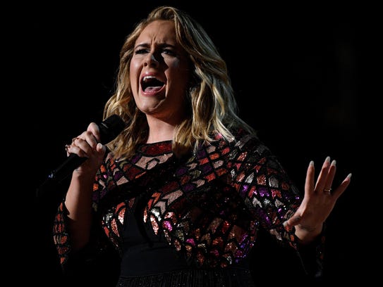 Adele opens the 59th Grammy Awards with her hit 'Hello.'