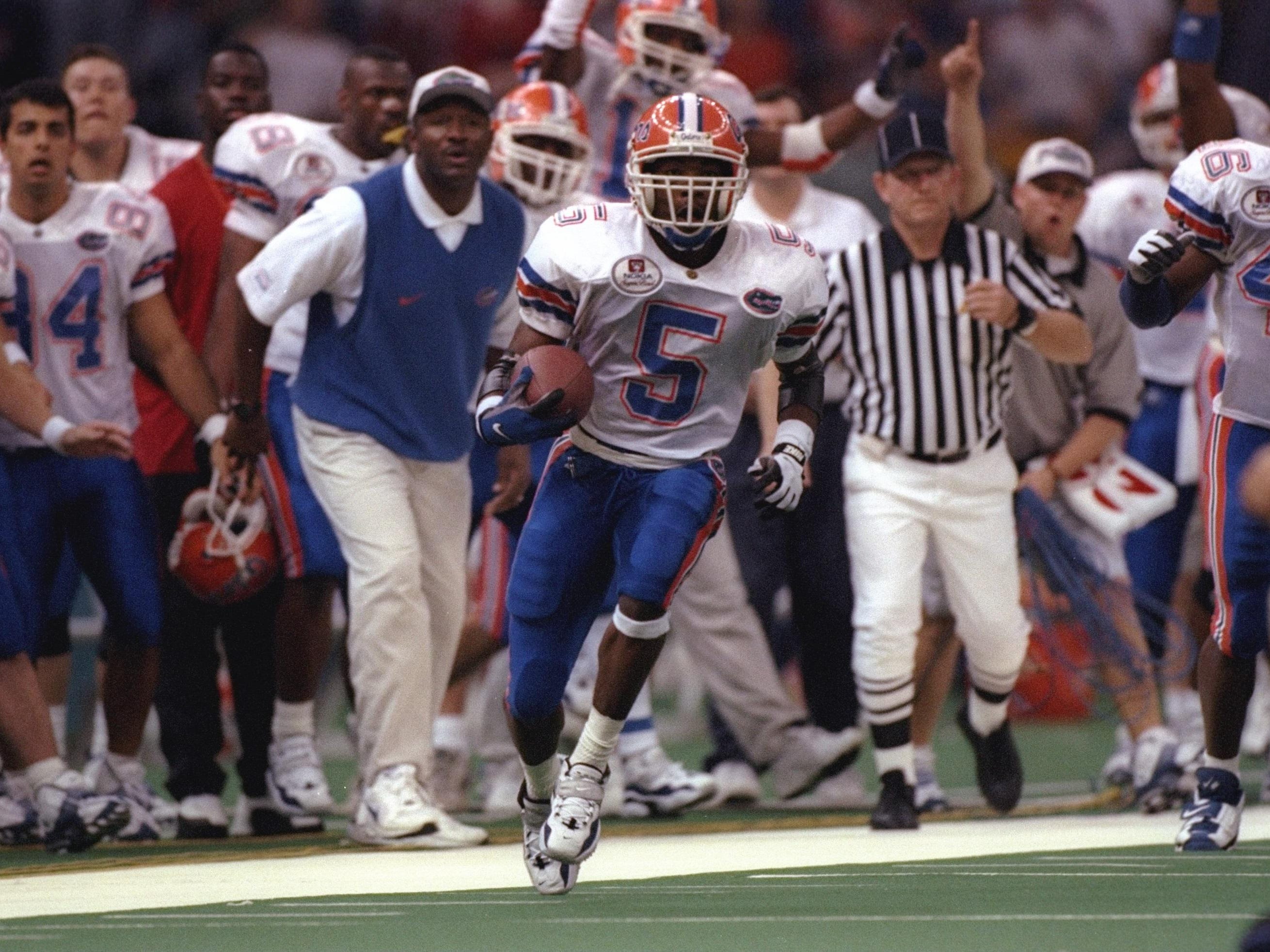 Florida wide receiver Jacquez Green gets up the sideline on a punt return during the Gators’ 52-20 win over No. 1 FSU in the 1997 Sugar Bowl, giving Florida a national championship.