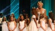 The Fleur-de-Lis Princesses watch as Miss Louisiana