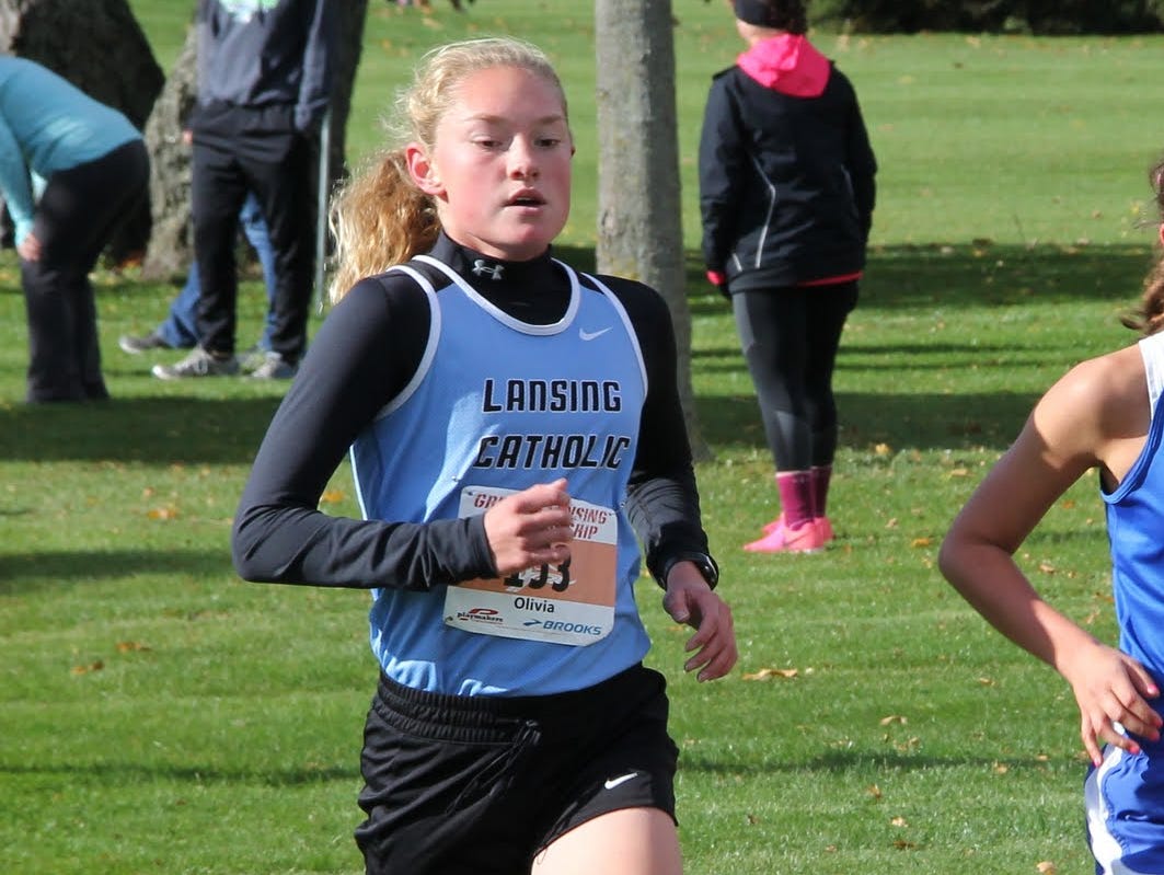 Olivia Theis has the top time among girls runners in the Lansing area.
