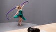 A dancer performs in front of Sony Alpha a99 II DSLR
