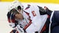 Sept. 14: Washington Capitals star Alex Ovechkin holds his head after catching a Winnipeg Jets player's stick under his visors. He was stitched up and returned to the game.