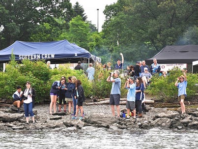 Suffern crew members, parents and other fans watch