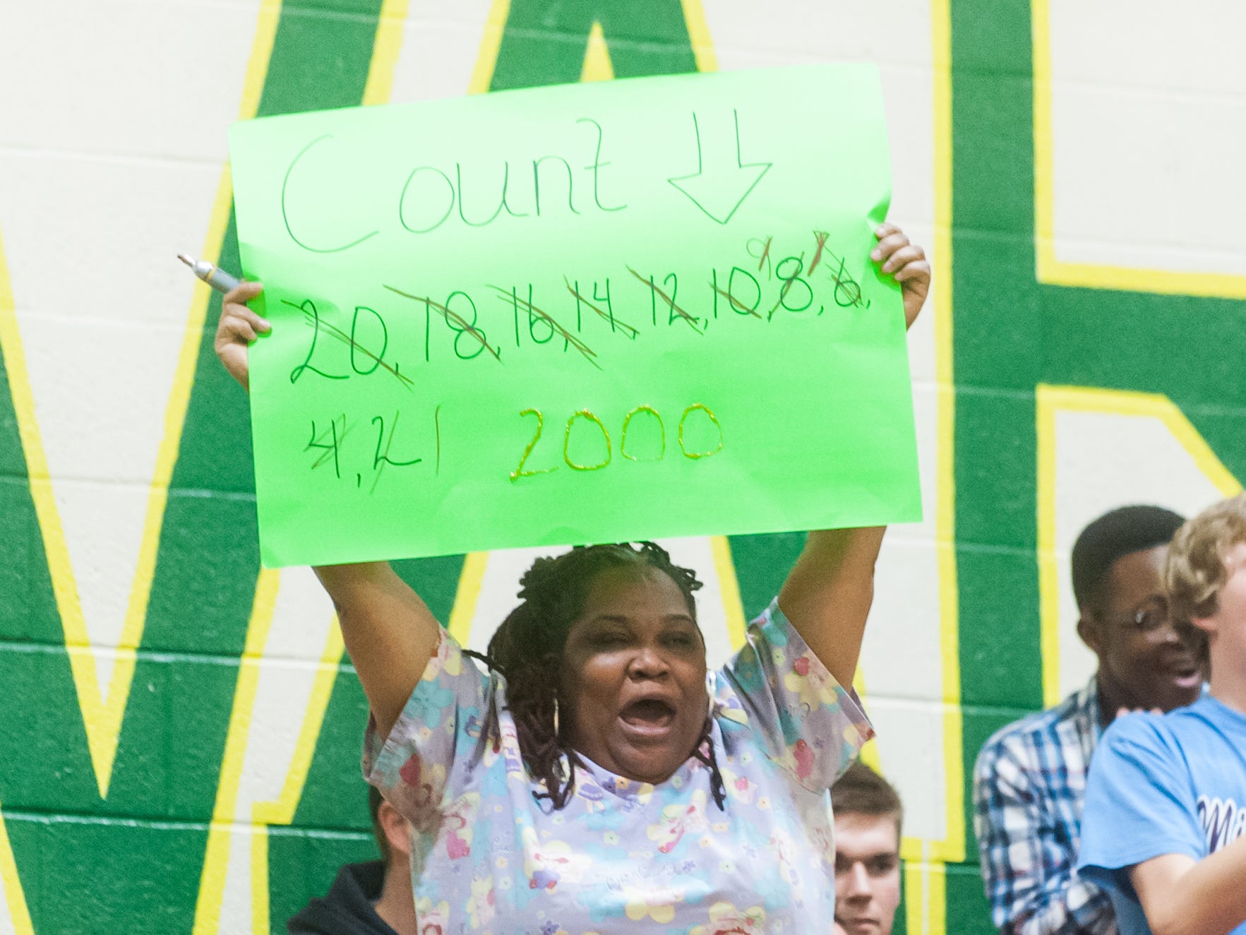 FAN OF THE WEEK: A family member of Mardela guard Demyra Selby celebrates Selby's 2000th against Wicomico on Thursday evening at Mardela High.