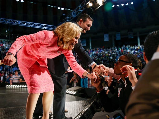 Sen. Ted Cruz, R-Texas, and his wife, Heidi, shake