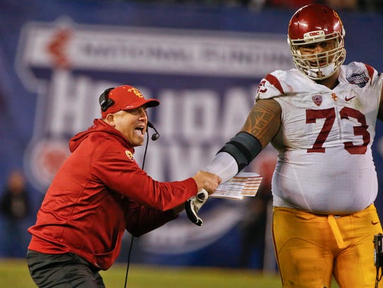 Clay Helton has a huge backer in 6-foot-8 offensive