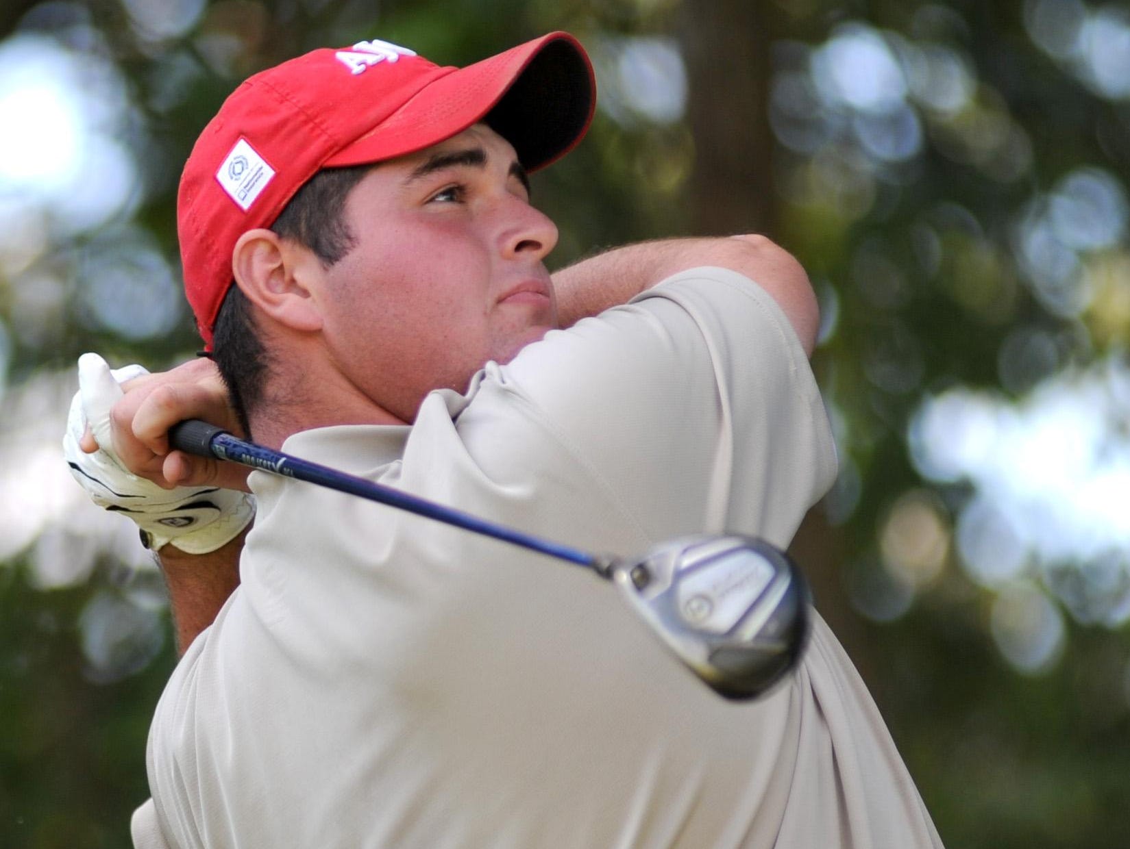 Colton Forcum, a 2013 Unioto graduate, watches his drive from the second tee during a Scioto Valley Conference golf match. Forcum was a two time SVC Player of the Year in his career.
