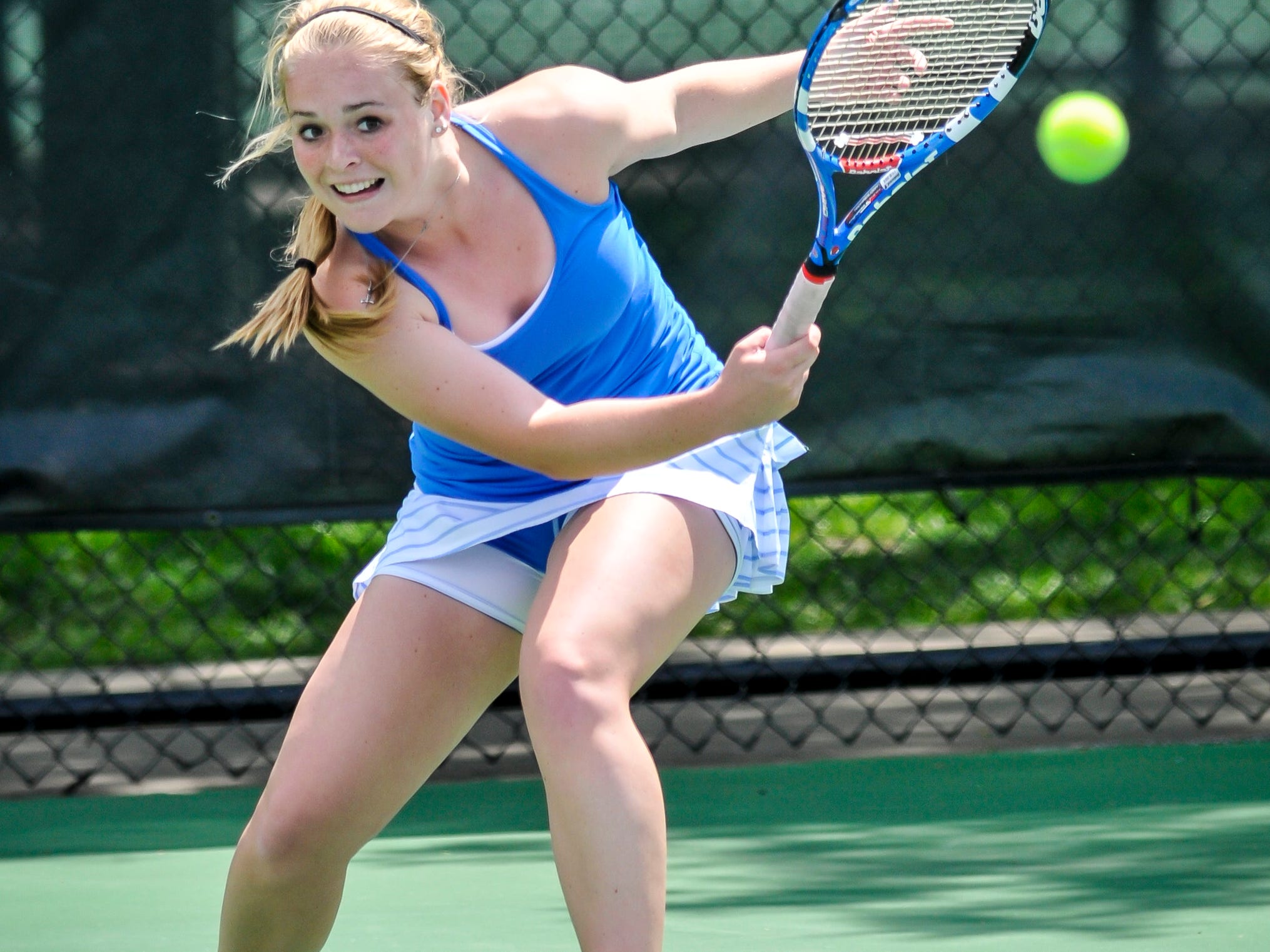 Meredith Laskey of Highlands returns the ball in the 2014 Kentucky state tennis tournament.