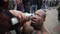 A man has his eyes cleaned after he was pepper sprayed