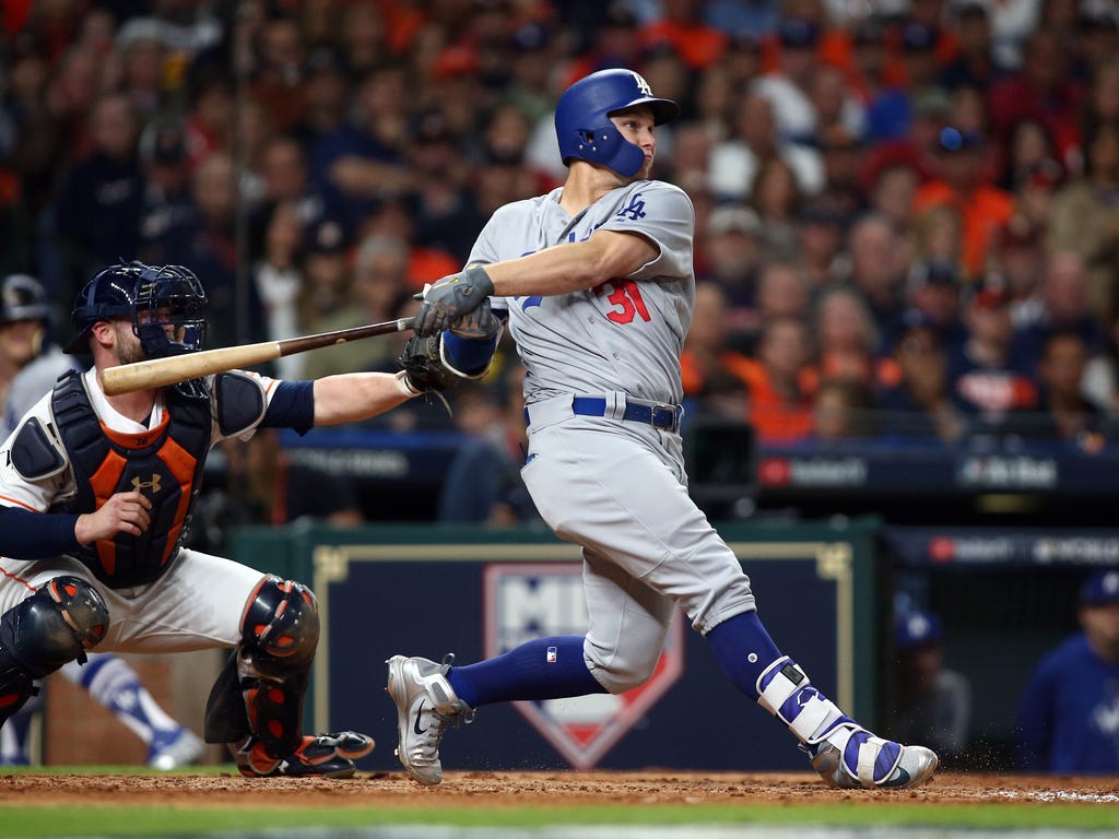 Dodgers hitter Joc Pederson connects on a three-run homer during the ninth inning of Game 4 of the World Series in Houston. Pederson's blast helped Los Angeles win 6-2 and even the series.