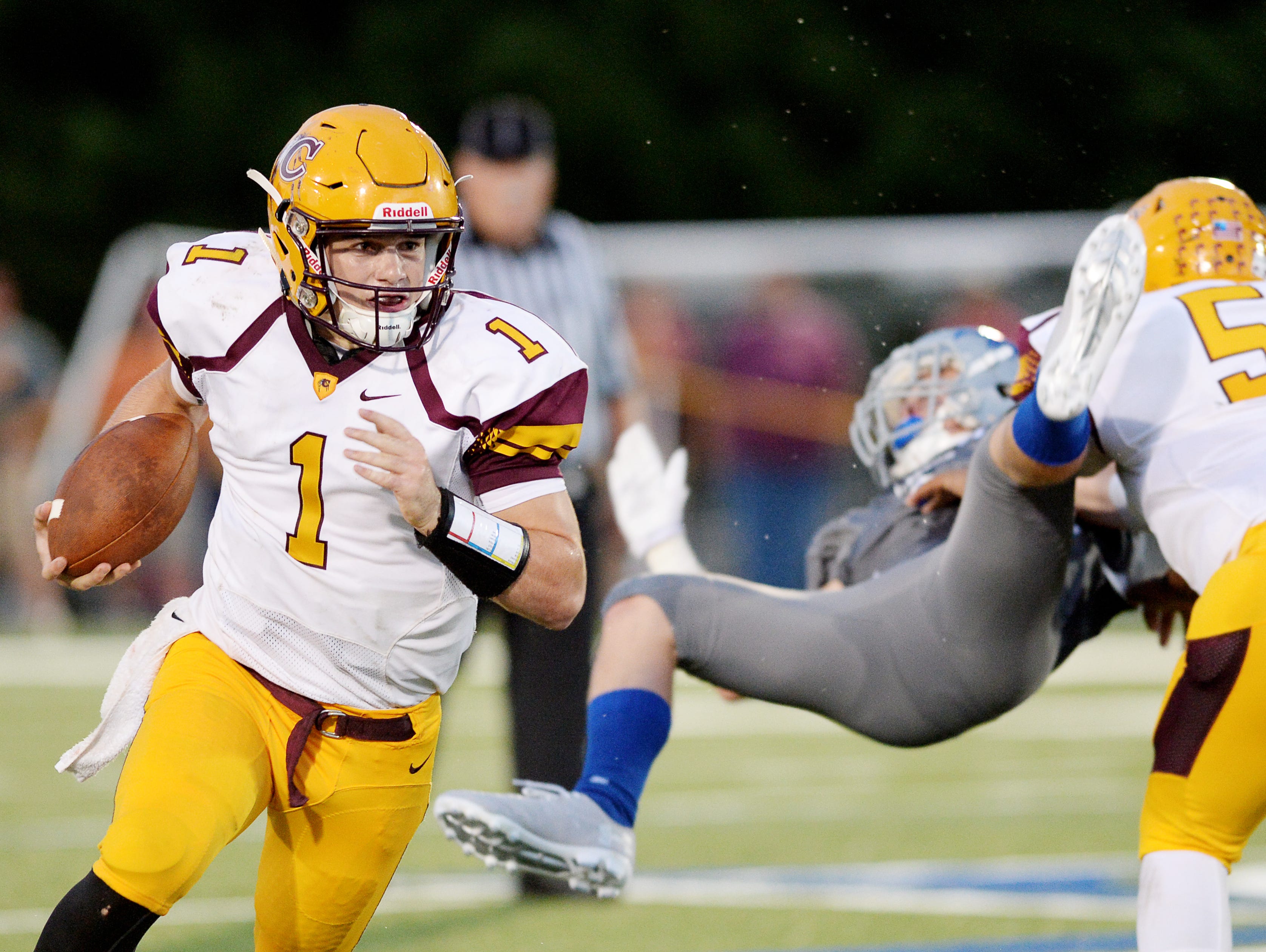 Cherokee quarterback Tye Mintz (1) carries the ball in Thursday's game at Smoky Mountain.