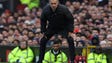 Manchester United manager Jose Mourinho looks on during