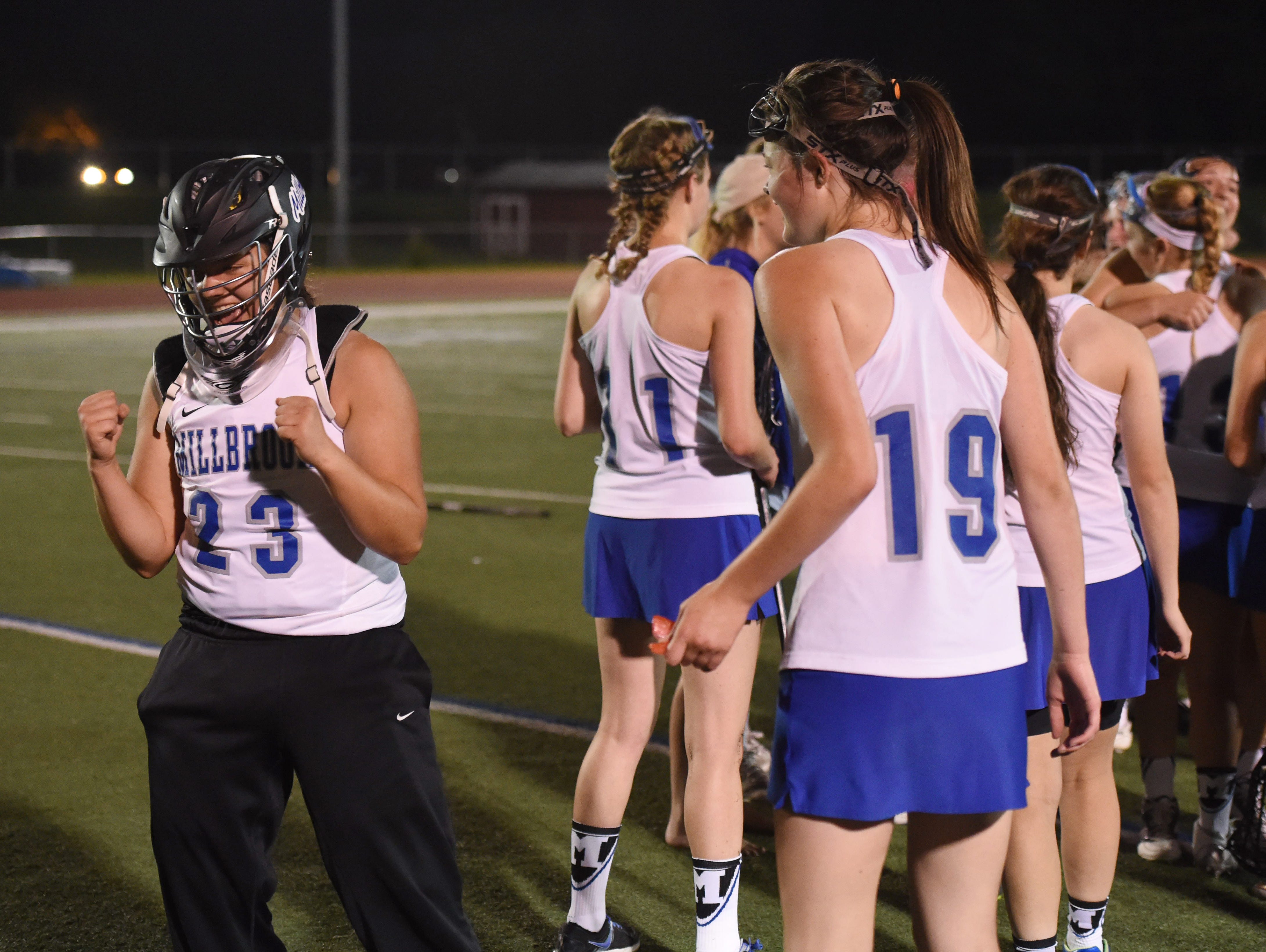Millbrook's Claire Martell pumps her fists after winning the Section 9 Class C girls lacrosse title.