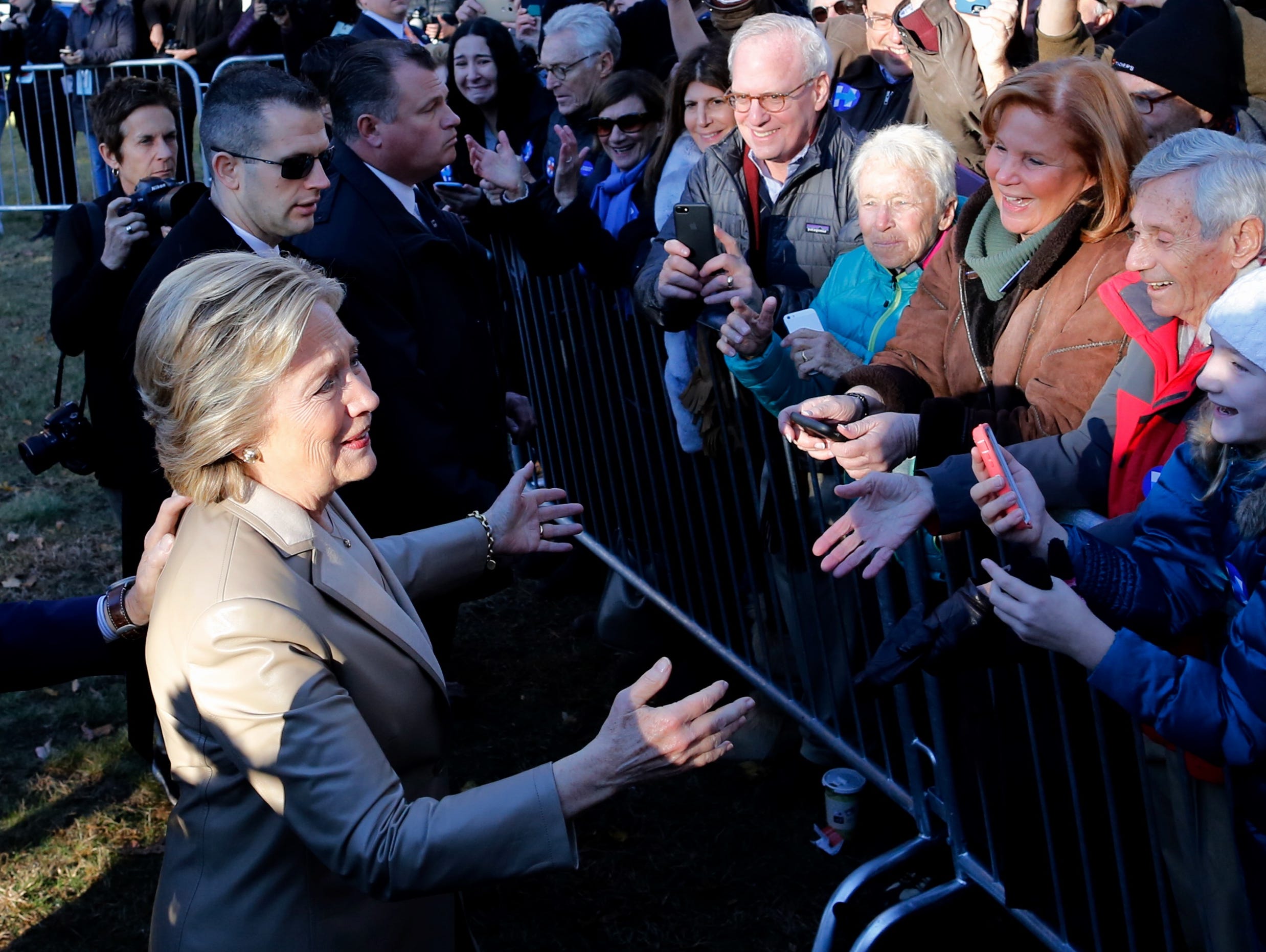 Hillary Clinton greets supporters after casting her vote in Chappaqua, N.Y., on Nov. 8, 2016.