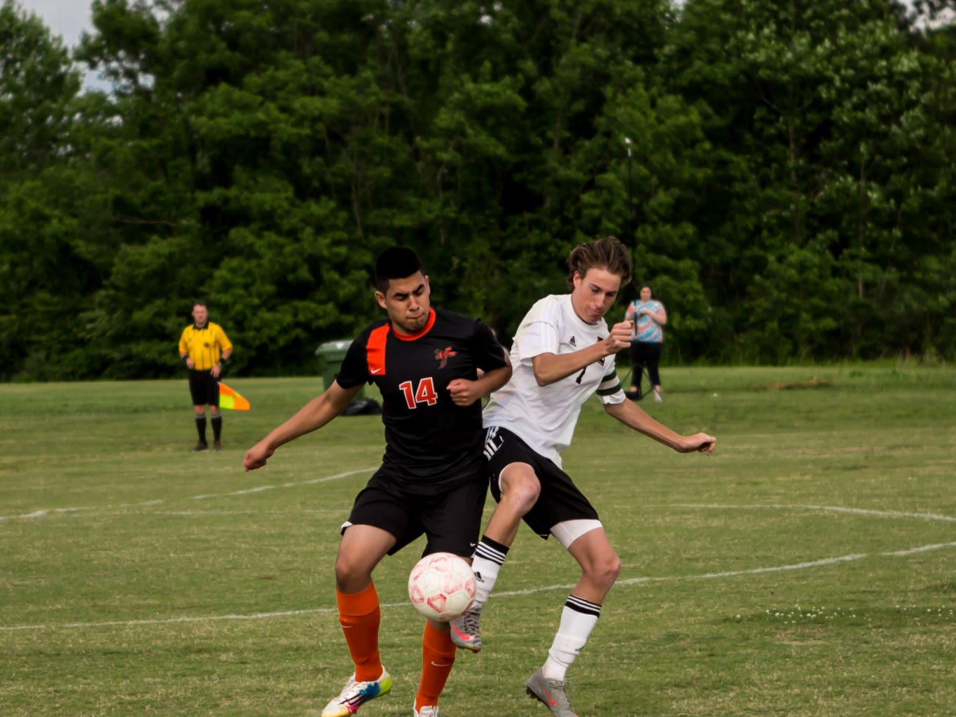 Lexington’s Wesley Larson (right) tries to get possession of the ball, while South Gibson’s Humberto Coronado defends.