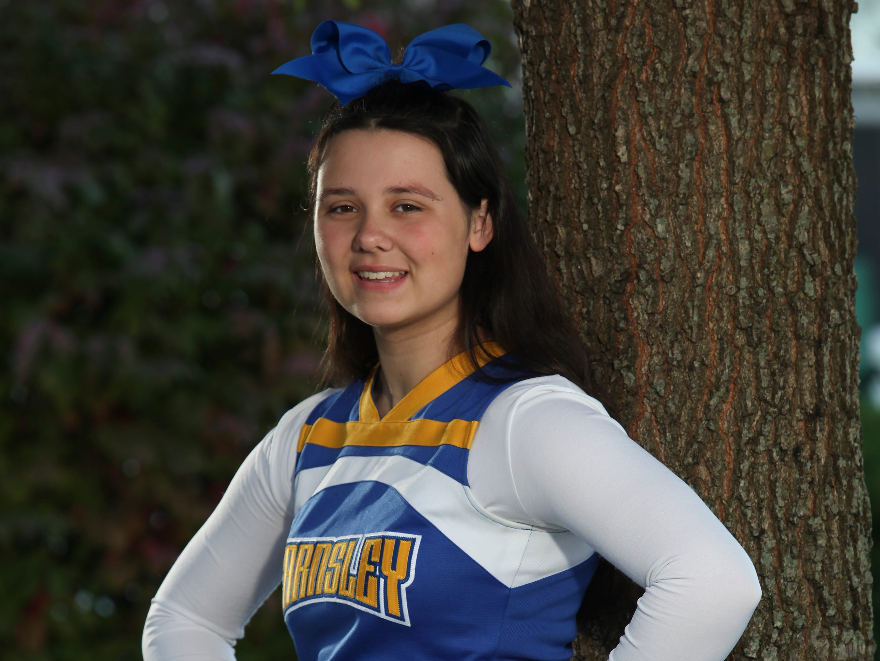 Hazlee Gaddie, 13, cheers for the Farnsley Midde School. Oct. 26, 2015