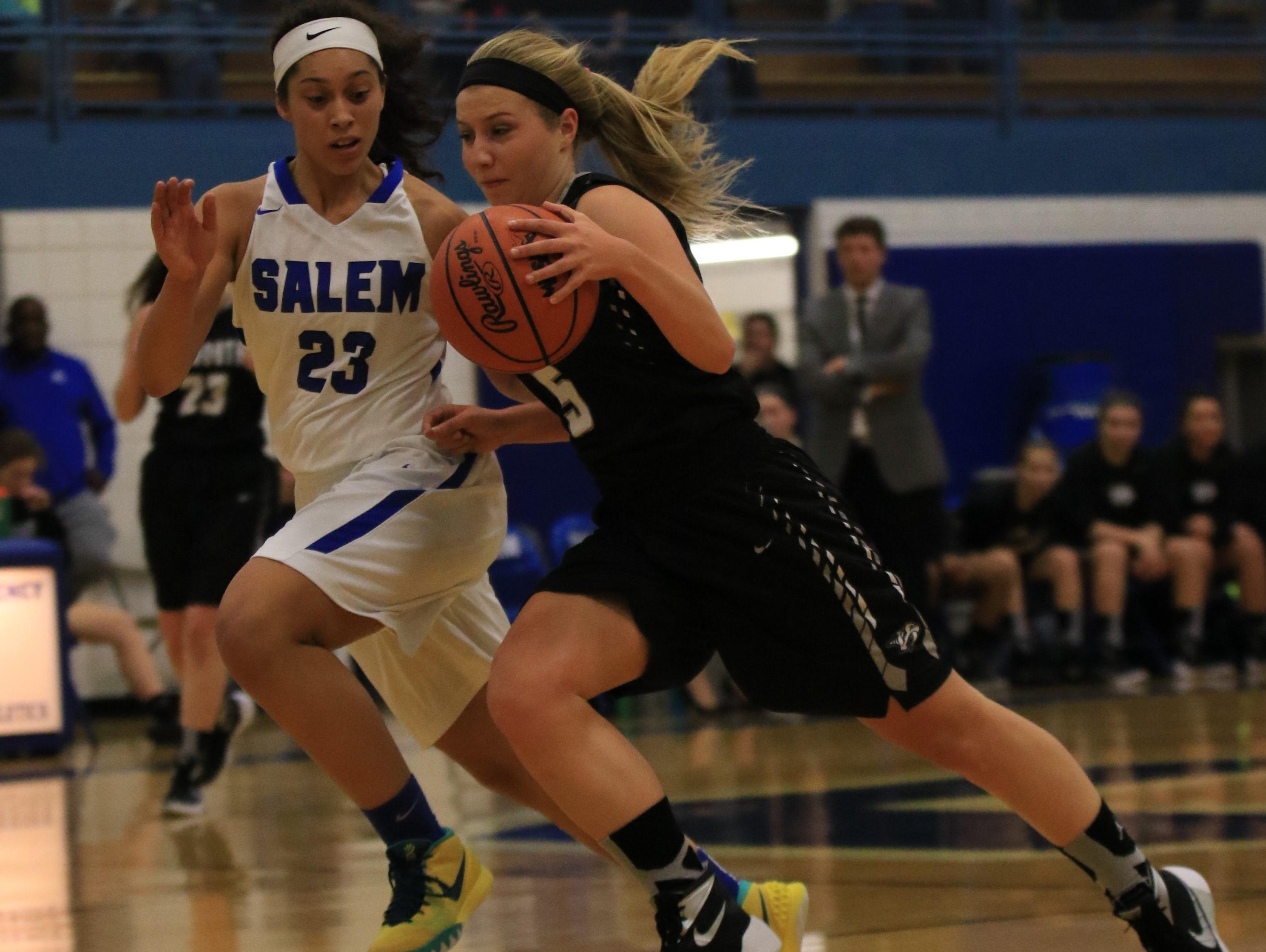 Salem’s Jala Petree (No. 23) tries to close in on Plymouth’s Hannah Badger (No. 5) during Tuesday’s game.