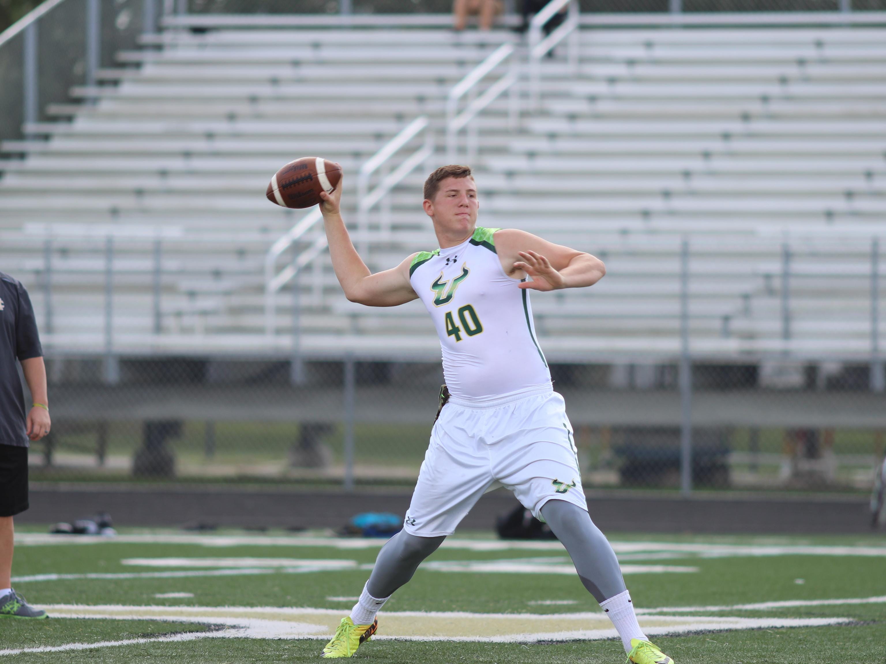 Island Coast quarterback Kory Curtis prepares to throw a pass during a 7-on-7 game at Golden Gate High School.