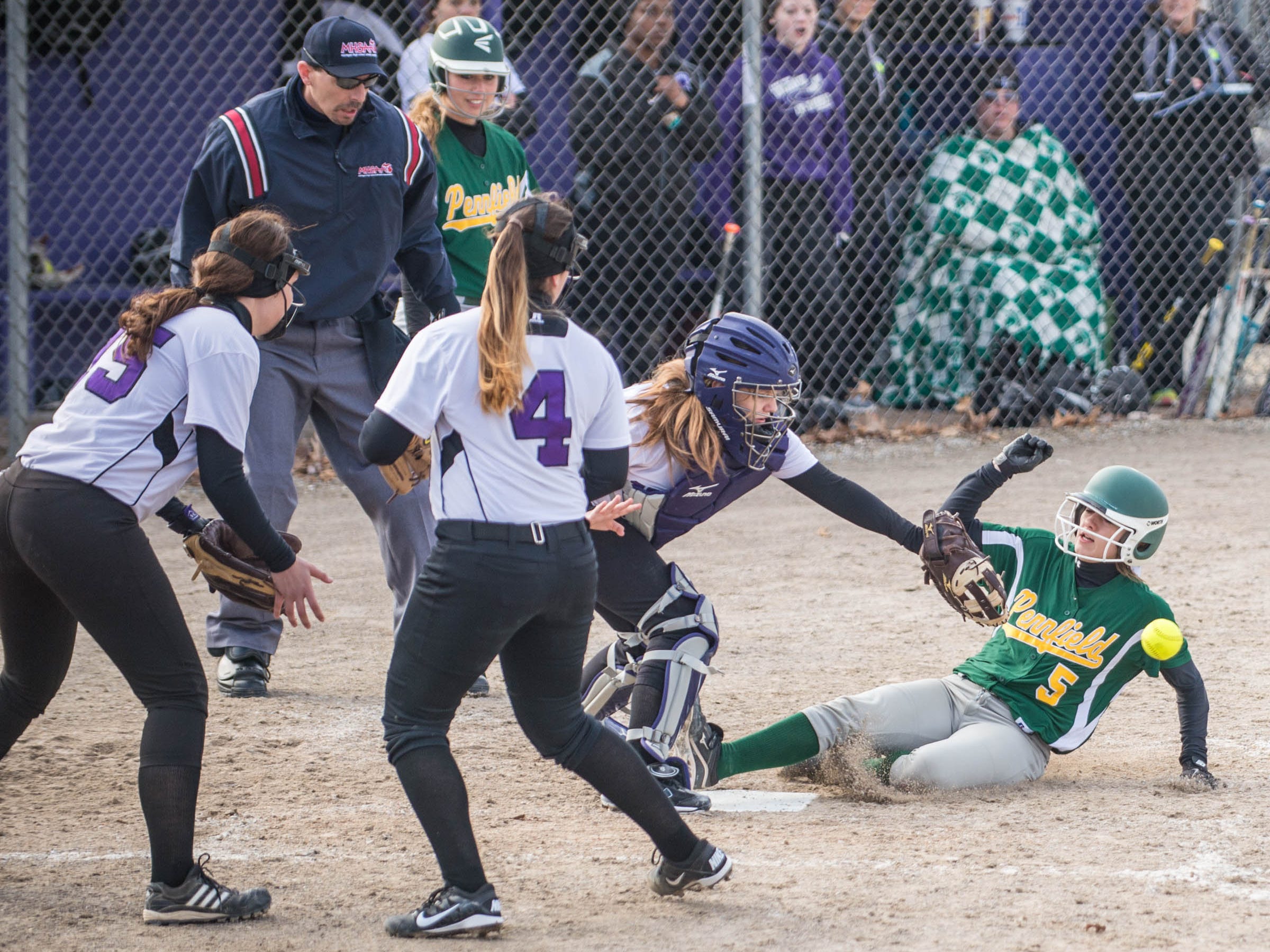 Pennfield's Jessica Roan slides into home plate during a recent game against Lakeview.