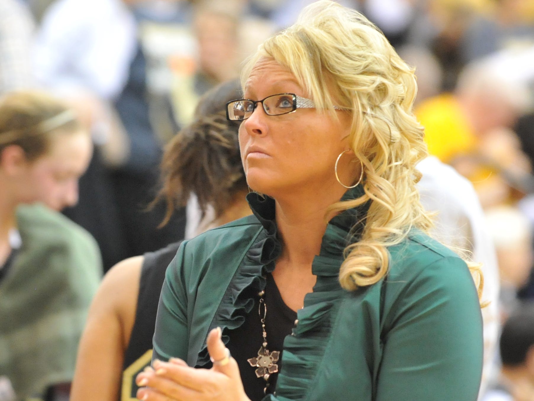Holly Gutierrez coaches Northeastern in a 2011 game. Gutierrez was announced as Winchester’s new coach Tuesday.