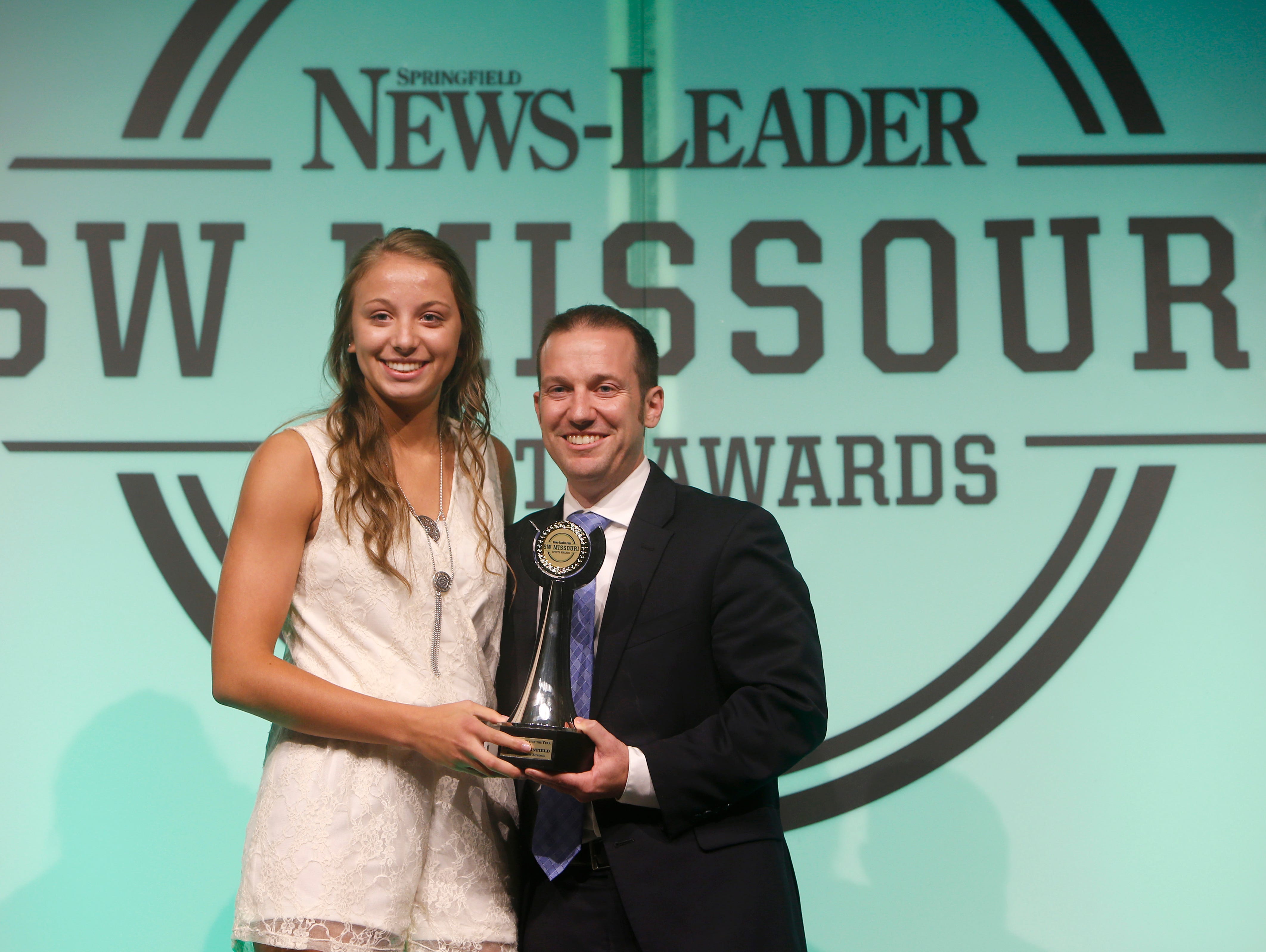 Brooke Stanfield was named the female athlete of the year during the 2016 Southwest Missouri Sports Awards at the Springfield Expo Center on Thursday, June 9, 2016. Presenting her with the award is News-Leader President Allen Jones.