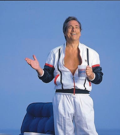 A portrait of Sterling, who also is a real estate entrepreneur, as he holds a mug and stands near a deck chair in  Malibu, Calif., June 1989.