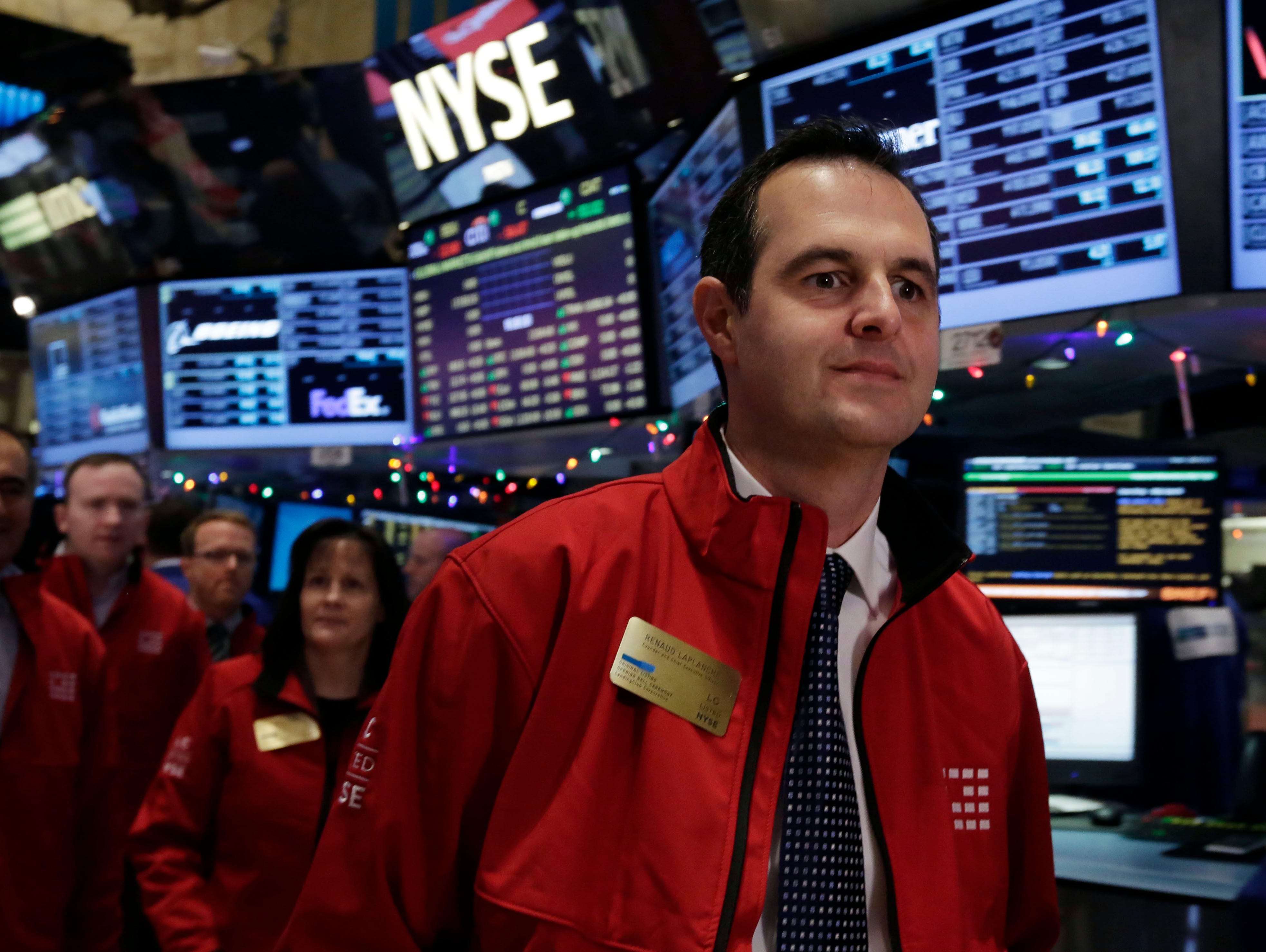 Renaud Laplanche, founder and CEO of LendingClub, arrives on the floor of the New York Stock Exchange before his company's IPO in December 2014.
