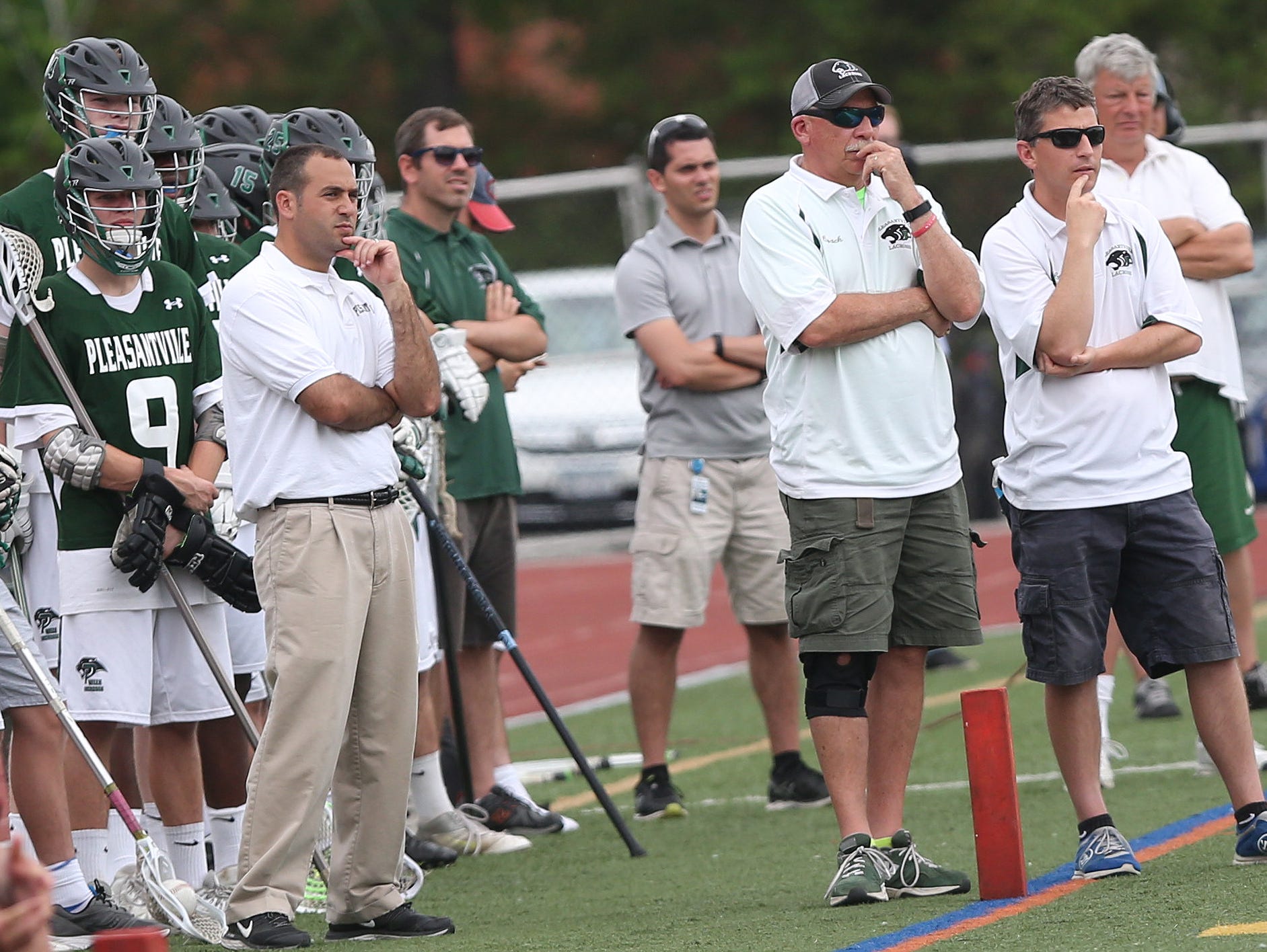 Pleasantville coach Chris Kear (right) watches as the Panthers defeated Rondout Valley in the state Class C regional lacrosse championship game at Dietz Stadium in Kingston June 4, 2016.