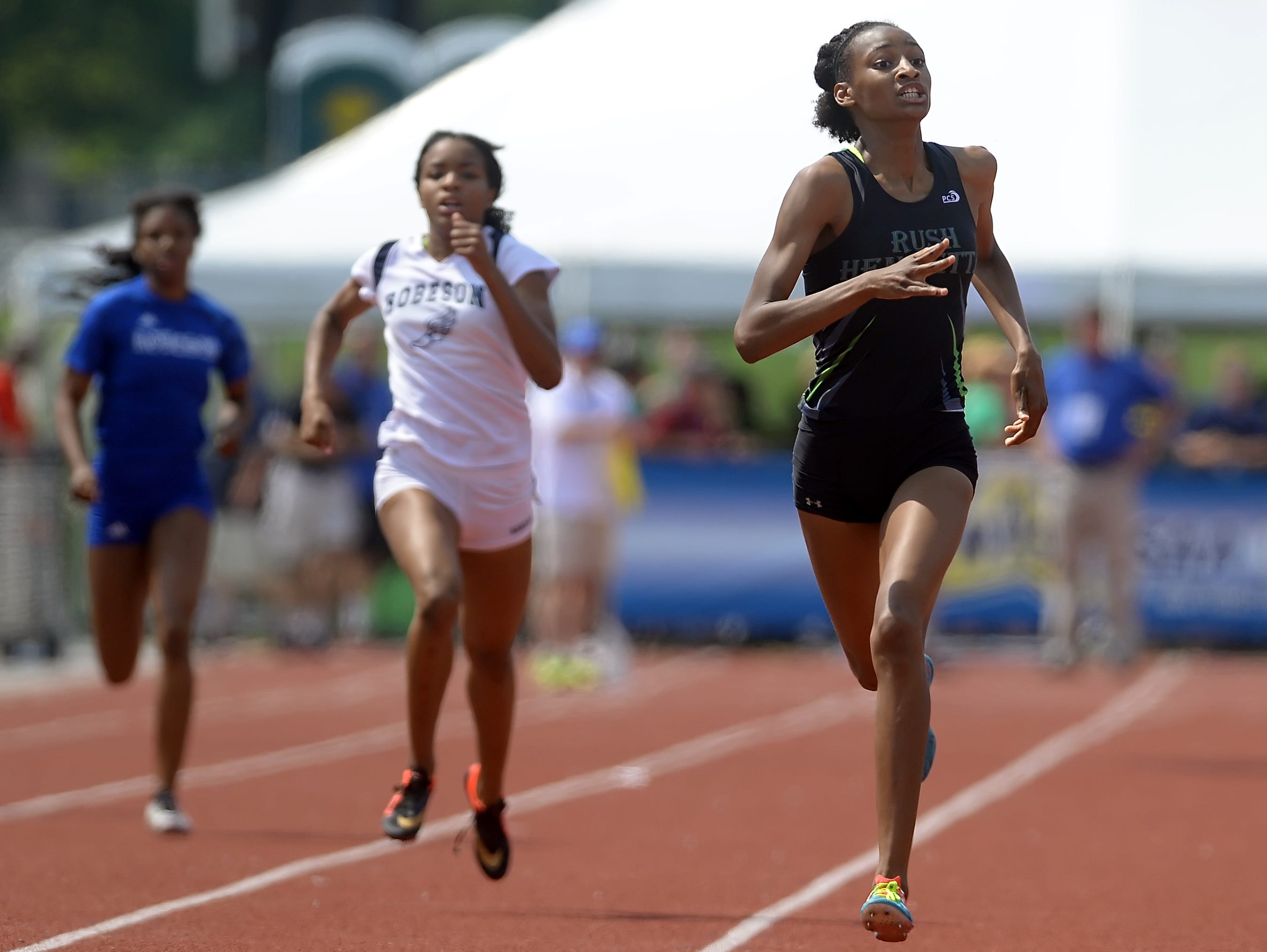 Rush-Henrietta's Sammy Watson, right at the 2015 high school outdoor state meet, won two events in here age division at the USA Track & Field National Junior Olympic Track & Field Championships.