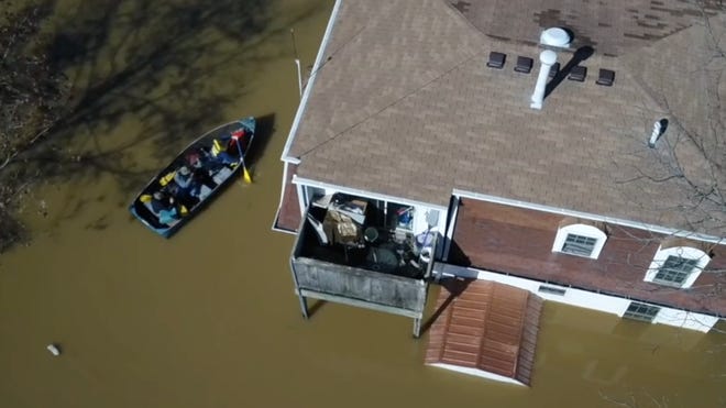 Scope of Louisville flooding seen in drone, helicopter video