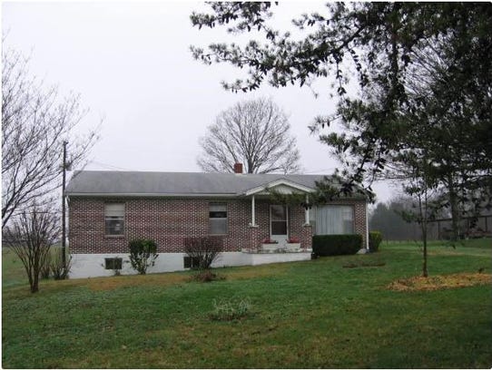 The 59 acres at 4157 Moss Road includes this home,