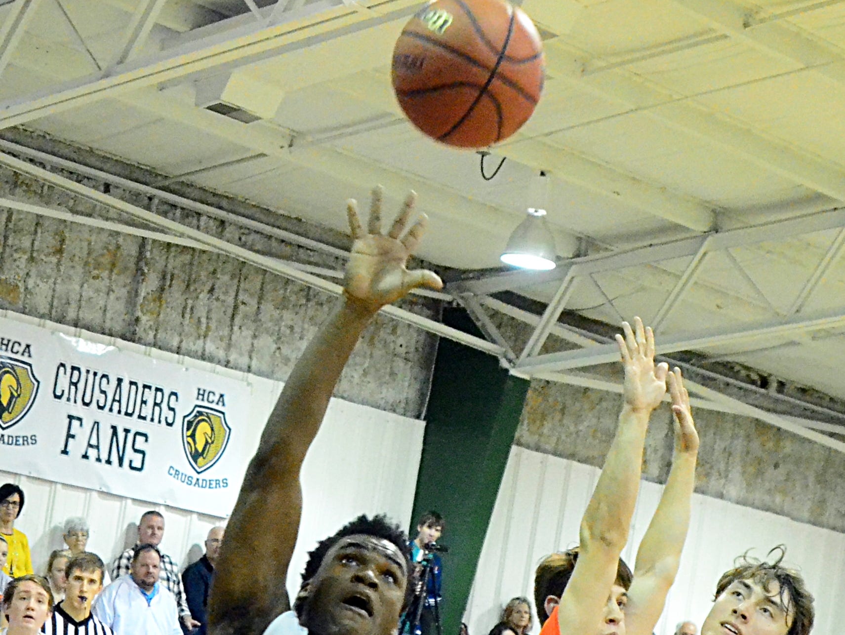 Hendersonville Christian Academy junior Andre Hambrick releases a layin during first-quarter action.